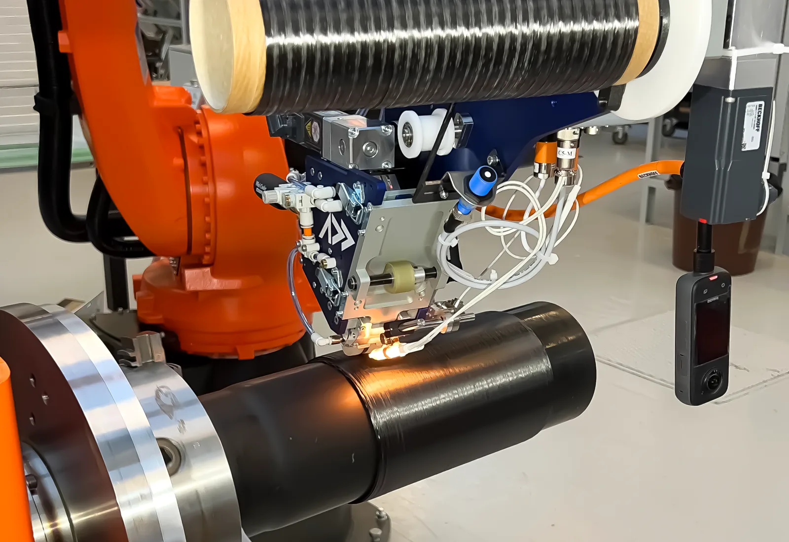 Robotic production of an EV automotive composite structure