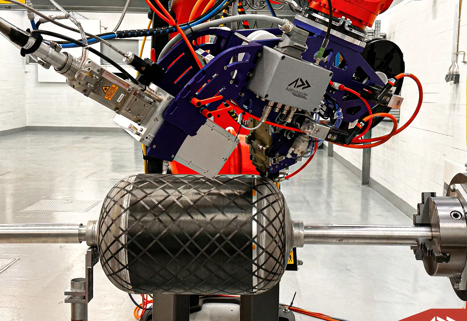 Real AFP system winding a composite pressure vessel in the Addcomposites lab