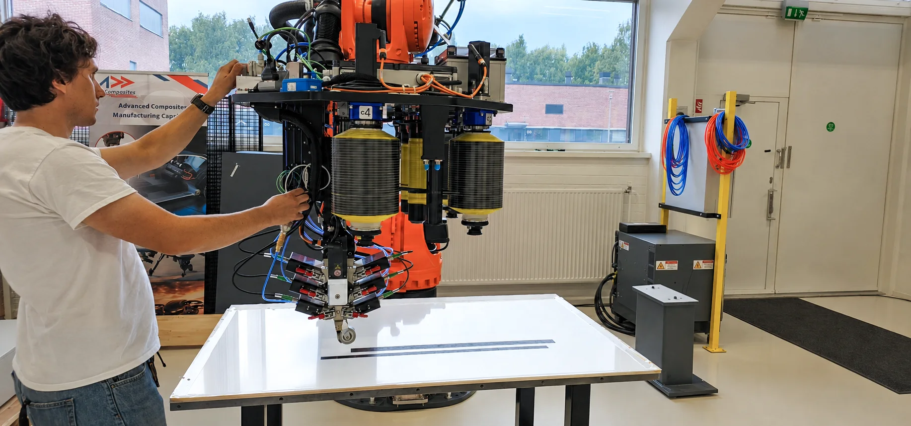 Engineer commissioning an industrial AFP system for traceable flight structures